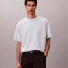 T-shirt med emblem och grafisk logotyp T-shirt med emblem och grafisk logotyp