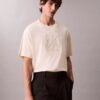 T-shirt med emblem och grafiskt tryck T-shirt med emblem och grafiskt tryck