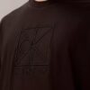 T-shirt med emblem och grafiskt tryck T-shirt med emblem och grafiskt tryck