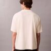 T-shirt med emblem och grafiskt tryck T-shirt med emblem och grafiskt tryck
