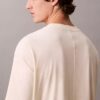 T-shirt med emblem och grafiskt tryck T-shirt med emblem och grafiskt tryck