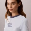 T-shirt med kort ärm och ringad krage samt logotyp T-shirt med kort ärm och ringad krage samt logotyp