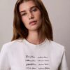 T-shirt med logotyp i grafisk stil T-shirt med logotyp i grafisk stil