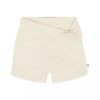 Texturerad skort med omlottframsida för flickor Texturerad skort med omlottframsida för flickor