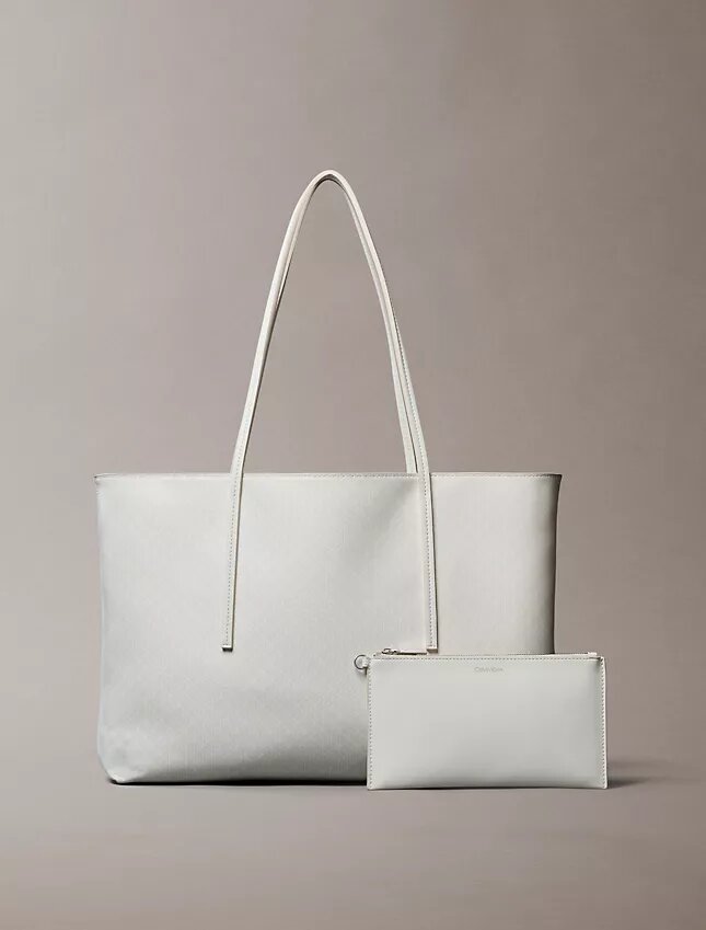 Tote-väska med emblem-logotyp över hela ytan och ficka Tote-väska med emblem-logotyp över hela ytan och ficka