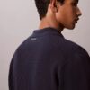Tröja med knappar och mesh-stickning Tröja med knappar och mesh-stickning