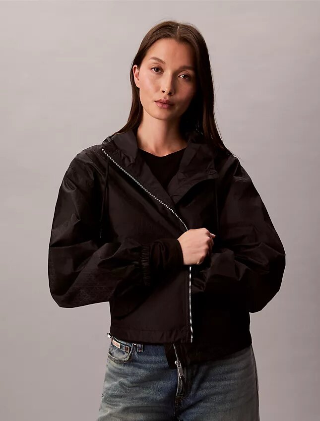 Vindjacka med jacquardmönster och emblem Vindjacka med jacquardmönster och emblem